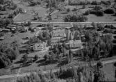 Flygfoto över Gärdebygården, S.M.F:s Semesterhem, Rättvik.