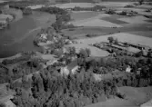 Flygfoto över Gustafs kyrka år 1964.
