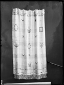 Stockholmsutställningen 1930
Vävd textil med blomsterbroderi.