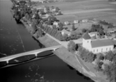 Flygfoto över Husby, samt kyrka, Hedemora, 1967.