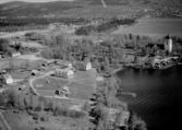 Flygfoto över Rättvik, Stiftsgården och kyrkan. 1962.