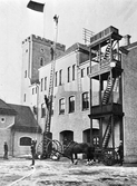 Brandövning på brandstation på Fabriksgatan, 1910-tal