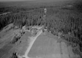 Flygfoto över Siljansnäs, Naturum och utsiktstorn.