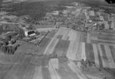 Flygfoto över Siljansnäs år 1947-1949. Siljansnäs kyrka.