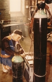 Man i arbete poå Åbyverken, 1980-tal