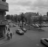 Hotell i hörnhuset och parkering på Järntorget, 1970-tal