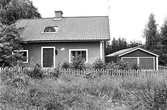 Torpet Sandtorp med garage under Karlslunds herrgård, 1981