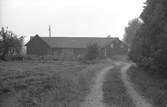 Bostadshus och ekonomibyggnad på Karlslunds herrgård, 1981