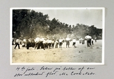 Säckhoppning och andra lekar på botten av en uttorkad flod under nationaldagen i McCook i Nebraska, 1913-07-04