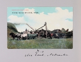 Vykort på ångdrivna tröskverk och arbetare i McCook i Nebraska, 1913