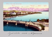 Vykort som ger en översiktsbild på Zürich med Alperna i bakgrunden, 1913