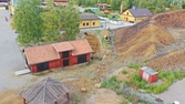 Arkeologisk schaktningsövervakning, kulvert vid Falu gruva
Kulvertens takstockar framrensade. Från SV.
L2001:4421.