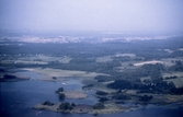 Flygfoto från Hjälmaren in mot norra Örebro, 1980-tal