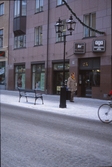 Drottninggatan 25 vid aga Egendomsaffär, 1980-tal