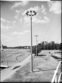 Stockholmsutställningen 1930
Strandpromenad med lampor på stolpe