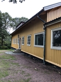 Ett gulmålat bostadshus på Sporred Tvärgården i Sporred, Kållered, i Mölndals kommun, den 20 september 2019. Byggt cirka 1940.