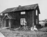 Man och kvinna med barn, 1910-tal