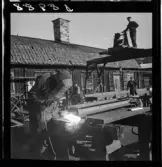 539 Söder. Svetsare i arbete vid bygge.