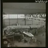 1678 P DC 6:a i hangar på Bromma rep. för Vi