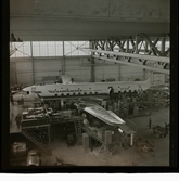1678 P DC 6:a i hangar på Bromma rep. för Vi