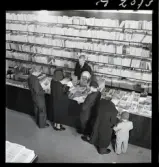 1697 Bokhandelsinteriör för kooperativa