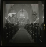 1950. Leksands kyrka. Folk i kyrbänkar