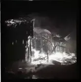 Tennishallen (gamla) brinner, 1948.