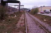 Järnvägsspår genom industriområde, 1990-tal