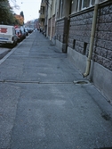 Vattenavrinning och asfaltering på gångbana, 1990-tal