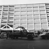 PARKERINGSHUS VID REGERINGSGAT.
EXT.