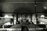 Interiör från Hälleberga kyrka innan branden 1976.