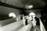 Läktaren i Hälleberga kyrka innan branden 1976.