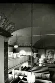 Interiör från Hälleberga kyrka innan branden 1976.