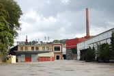 Byggnaderna 23 (verkstad/ritkontor), 110 (lagerbyggnad) och skorstenen efter att företaget hade lagts ner, Papyrus/Soab år 2010. 
Relaterade motiv: 2024_1159 - 1183.