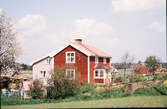 Villansdal på Hovshaga i Växjö. I bakgrunden gården Björksätra. 1968.