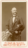 Porträtt av uniformerad man, 1875