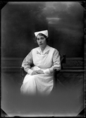 Kvinna i sköterskeuniform