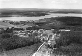 Vy över en del av Rottne med Söraby kyrka i bakgrunden.