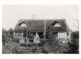 Tivedstugan med vaktmästarbostad och servering i Påskbergsskogen år 1908.