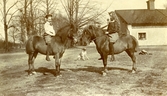 Två barn med hästar på Färna herrgård,, 1912