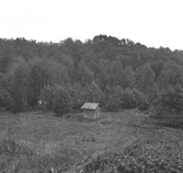 Avesta stad, dal med spruthus mellan Djäknehyttan och Nybyn.