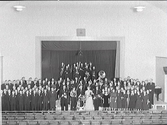 Folkskolan/Rosenfredsskolans aula. Orkester och kvartettsällskapet i Varberg. Från vänster: Karl Ljunggren, Yngve Johansson 