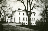 Vit herrgårdsbyggnad, ca 1920