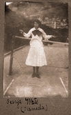 Georga Watts vid tennisnätet, 1918