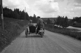 Motorcyklister med sidovagn, 1950-tal