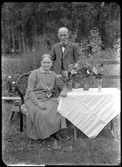 Grupporträtt, 70-års foto. Fru Eriksson, Vänsta, Kolbäck.
Ur Gustaf Åhmans samling.