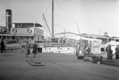 Båtarna Örebro II och G. Lagerbjelke vid kaj i Stockholm, 1930-08-10