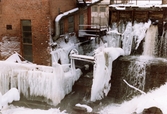 Industribebyggelse vid Mölndalsfallen i Kvarnbyn, Mölndal, i januari 1984.