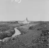 Falun, gruvbäcken och Västra folkskolan 1916.
