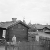 Falun, gård med Bergslagsmärket vid Bergsmansgränd och O. Haglund 1921.